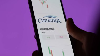 Takas ekranında Comerica 'nın logosu. Comerica hisse senetleri, cihaza CMA $.