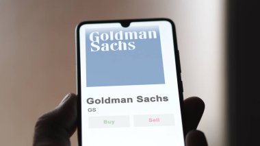 Takas ekranında Goldman Sachs 'ın logosu. Goldman Sachs hisse senetleri, bir cihaza GS $.