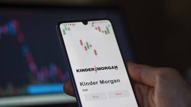 Değiş tokuş ekranında Kinder Morgan 'ın logosu. Kinder Morgan hisse senetleri, KMI $bir aygıt üzerinde.