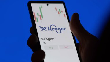 Takas ekranındaki Kroger logosu. Kroger hisse senetleri, bir aygıt için KR $.