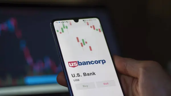 stock image The logo of U.S. Bank on the screen of an exchange. U S  Bank price stocks, $USB on a device.