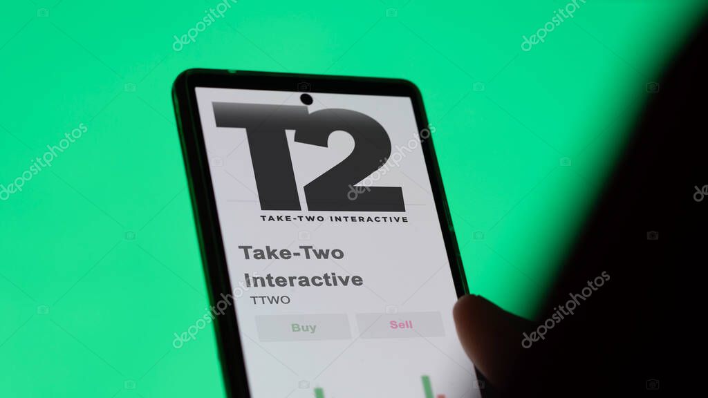 The logo of Take-Two Interactive on the screen of an exchange. Take-Two Interactive price stocks, $TTWO on a device.