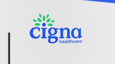 Beyaz ekran duvarındaki Cigna logosu. Cihazın üzerindeki Cigna damgası.