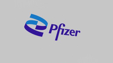 Beyaz ekran duvarında Pfizer logosu. Pfizer damgası bir aygıt üzerinde.