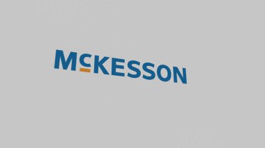 Beyaz ekran duvarındaki McKesson logosu. McKesson bir cihaza damga vurdu.