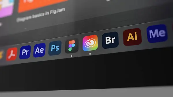 Figma logosu ve Adobe Yaratıcı Süit logosu. Adobe ve Figma bir tasarım araçları süitinde.