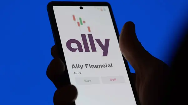 stock image The logo of ally incorporated  on the screen of an exchange. Ally Financial price stocks, $ALLY on a device.
