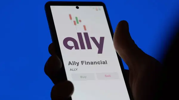 Stock image The logo of ally incorporated  on the screen of an exchange. Ally Financial price stocks, $ALLY on a device.