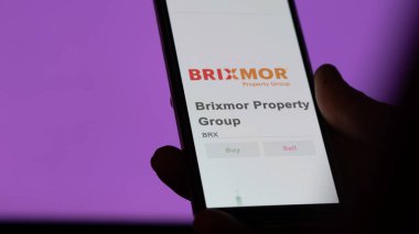 Brixmor Emlak Grubu 'nun borsadaki ticaret sayfası, bir hissedar, Brixmor Emlak' ın $BRX 'ını analiz ediyor, bir cihaz üzerinde..