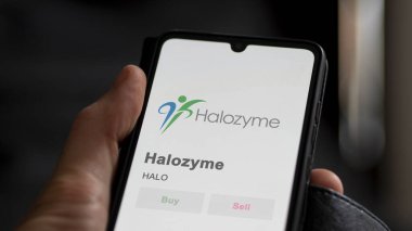 Bir borsada Halozyme 'un ticaret sayfası, bir hissedar, bir cihaz üzerinde HALO, Halozyme' u analiz ediyor..