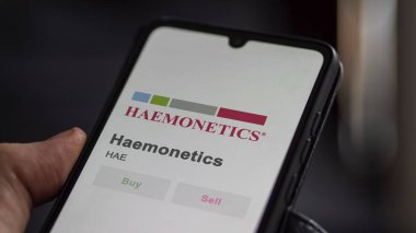 Bir borsada Haemonetics 'in ticaret sayfası, bir hissedar, bir cihaz üzerinde HAE, Haemonetics' i analiz ediyor..