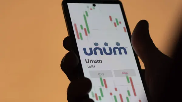 stock image November 20th 2023. The logo of Unum on a giant white screen, the brand  on a device.