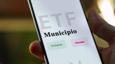 An investor analyzing an etf fund. ETF text in Spanish : muni, buy, sell.