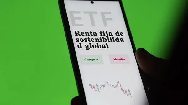 An investor analyzing an etf fund. ETF text in Spanish : Global Sustainability Fixed Income, buy, sell.