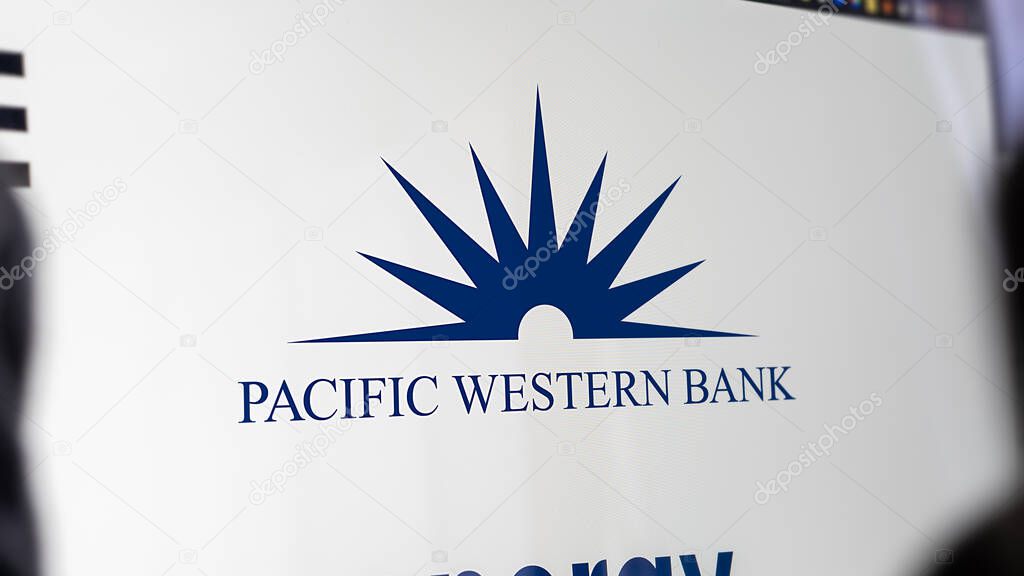 Logo of Pacific Western Bank on a screen. A wall of screens with the Pacific Western's logo.