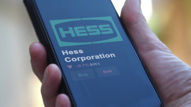 15 Ocak 2024. Hess Şirketi 'nin logosu bir değiş tokuş ekranında. Hess Şirketi hisse senetleri, bir cihaza HES $.