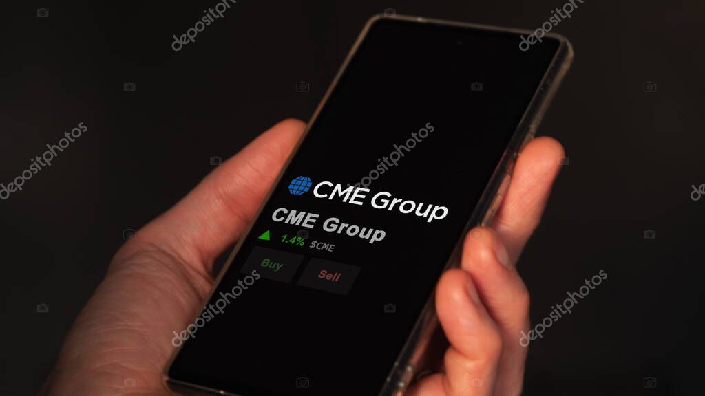 January 15th 2024. The logo of CME Group on the screen of an exchange. CME Group price stocks, $CME on a device.