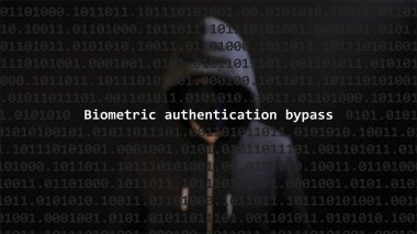 Cyber attack biometric authentication bypass text in foreground screen, anonymous hacker hidden with hoodie in the blurred background. Vulnerability text in binary system code on editor program. clipart