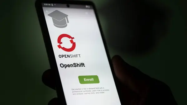 stock image March 04th 2024. Student enrolls to OpenShift program on a phone, upskilling certification by e-learning