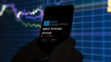 15 Ocak 2024. WEC Enerji Grubu 'nun logosu bir takas ekranında. WEC Enerji Grubu hisse senetleri, bir aygıt için WEC $.