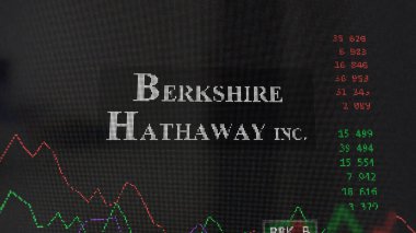 19 Mart 2024. Berkshire Hathaway 'in logosu bir değiş tokuş ekranında. Berkshire Hathaway hisse senetleri, bir cihaza BRKB dolar..