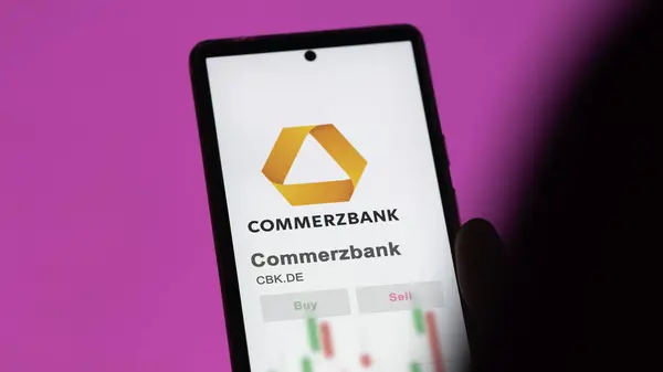 stock image 26th March 2024, Frankfurt ,Germany, investor analyzing CBK Commerzbank, shares on a stocks exchange