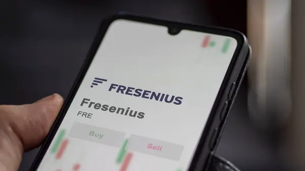 stock image 26th March 2024, Frankfurt ,Germany, investor analyzing FRE Fresenius, shares on a stocks exchange