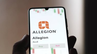 24 Nisan 2024. Bir değiş tokuş ekranında Allegion 'un logosu. Allegion hisse senetleri, cihaz için ALLE $.