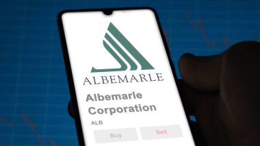 April 04th 2024. The logo of Albemarle Corporation on the screen of an exchange. Albemarle Corporation price stocks, $ALB on a device. clipart