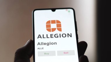 24 Nisan 2024. Bir değiş tokuş ekranında Allegion 'un logosu. Allegion hisse senetleri, cihaz için ALLE $.