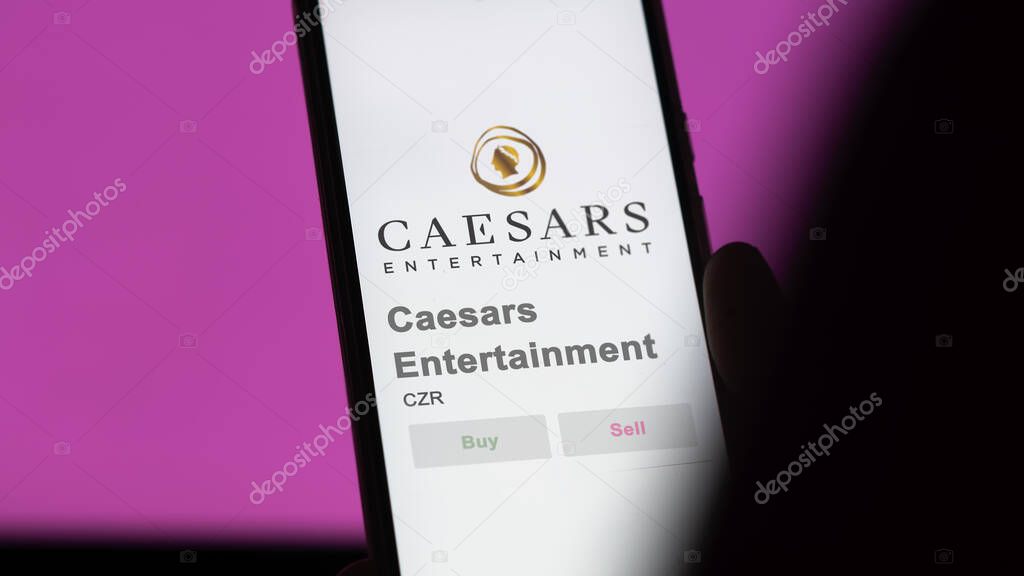 April 04th 2024. The logo of Caesars Entertainment on the screen of an exchange. Caesars Entertainment price stocks, $CZR on a device.