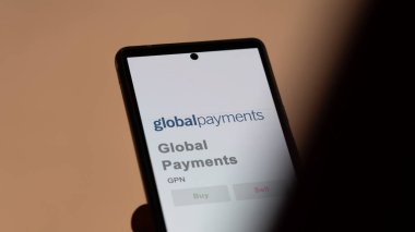 24 Nisan 2024. Küresel Ödemeler 'in logosu bir değiş tokuş ekranında. Küresel Ödemeler hisse senetleri, bir aygıt üzerinde GPN $.