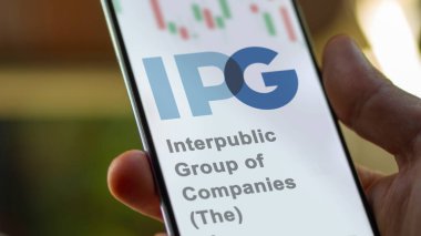 24 Nisan 2024. Bir takas ekranında Interpublic Group of Companies (The) logosu. Uluslararası Şirketler Grubu (The) fiyat hisseleri, bir aygıt üzerindeki IPG $.