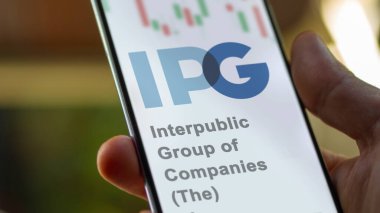 April 04th 2024. The logo of Interpublic Group of Companies (The) on the screen of an exchange. Interpublic Group of Companies (The) price stocks, $IPG on a device. clipart