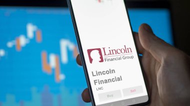 24 Nisan 2024. Bir değiş tokuş ekranında Lincoln Finans 'ın logosu. Lincoln Finansal Fiyat Hisseleri, Bir cihaz için LNC $.