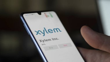 April 04th 2024. The logo of Xylem Inc. on the screen of an exchange. Xylem Inc  price stocks, $XYL on a device. clipart