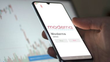 April 04th 2024. The logo of Moderna on the screen of an exchange. Moderna price stocks, $MRNA on a device. clipart