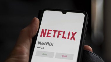 April 04th 2024. The logo of Netflix on the screen of an exchange. Netflix price stocks, $NFLX on a device. clipart