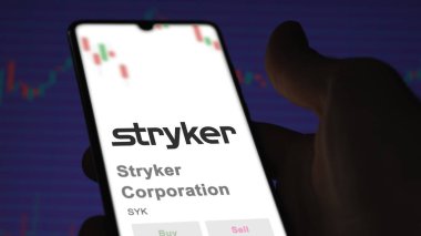 April 04th 2024. The logo of Stryker Corporation on the screen of an exchange. Stryker Corporation price stocks, $SYK on a device. clipart