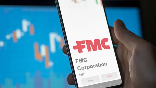 stock image April 04th 2024. The logo of FMC Corporation on the screen of an exchange. FMC Corporation price stocks, $FMC on a device.