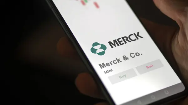 stock image April 04th 2024. The logo of Merck n Co. on the screen of an exchange. Merck & Co  price stocks, $MRK on a device.