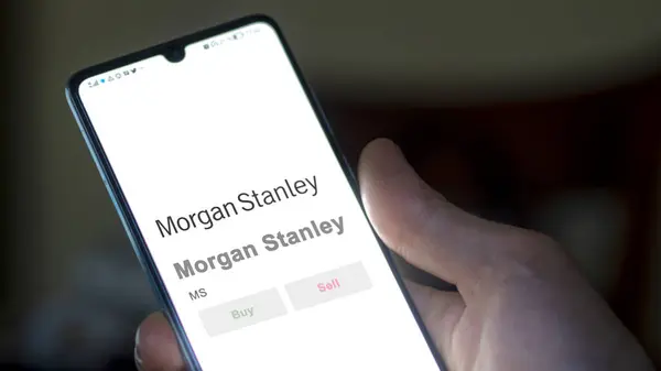 stock image April 04th 2024. The logo of Morgan Stanley on the screen of an exchange. Morgan Stanley price stocks, $MS on a device.