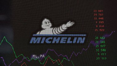 April 13th 2024 , Paris, France. Close up on logo of Michelin on the screen of an exchange. Michelin price stocks, $ML.PA on a device. clipart