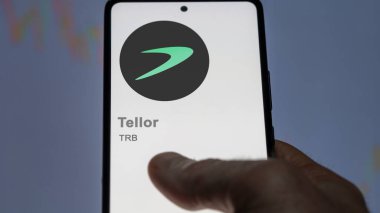 April 17th 2024 , Shanghai, China. Close up on logo of (TRB) Tellor on the screen of an exchange. (TRB) Tellor price stocks, $TRB on a device. clipart