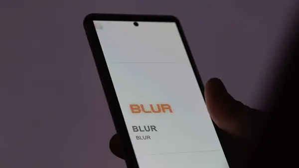 stock image April 17th 2024 , Shanghai, China. Close up on logo of (BLUR) BLUR  on the screen of an exchange. (BLUR) BLUR  price stocks, $BLUR on a device.