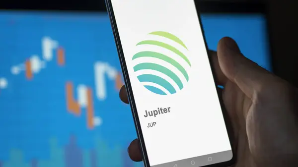 stock image April 17th 2024 , Shanghai, China. Close up on logo of (JUP) Jupiter on the screen of an exchange. (JUP) Jupiter price stocks, $JUP on a device.