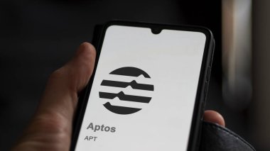 April 20th 2024 , Shanghai, China. Close up on logo of (APT) Aptos on the screen of an exchange. (APT) Aptos price stocks, $APT on a device. clipart