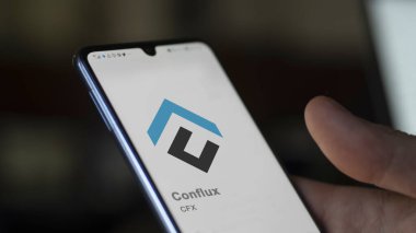 20 Nisan 2024, Şangay, Çin. Değiş tokuş ekranındaki (CFX) Conflux logosuna yaklaş. (CFX) Bir aygıt üzerinde Conflux fiyat hisseleri, $CFX.