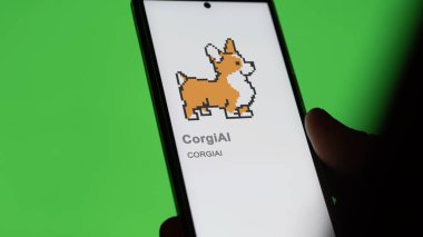 20 Nisan 2024, Şangay, Çin. CorgiAI 'nin logosunu kapatın (CORGIAI) bir takas ekranında. (CORGIAI) CorgiAI hisse senetleri, bir cihazda $CORGIAI.