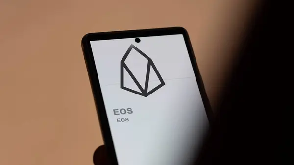 stock image April 20th 2024 , Shanghai, China. Close up on logo of (EOS) EOS on the screen of an exchange. (EOS) EOS price stocks, $EOS on a device.